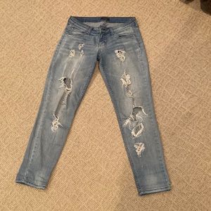 Low rise light blue ripped jeans